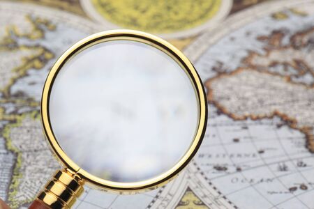 Map and magnifying glass