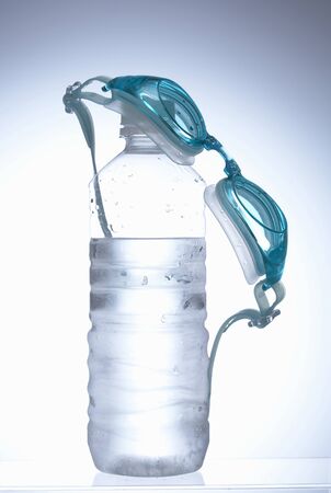 Goggles and plastic bottlesの写真素材