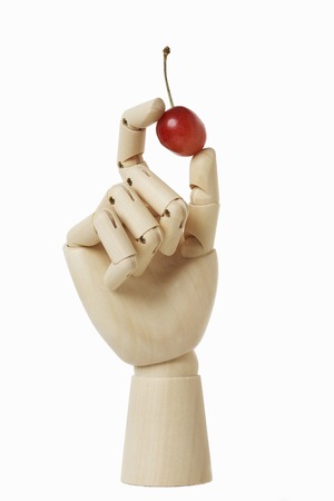 Hand with cherriesの写真素材