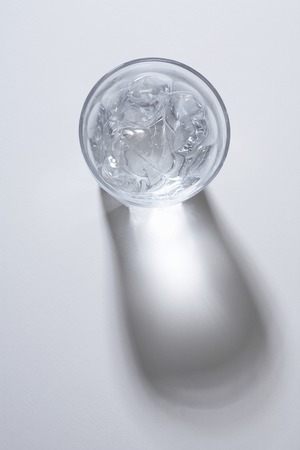 Water that is poured into a cupの写真素材