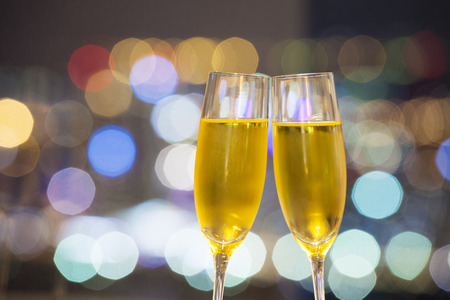 Champagne glass and night viewの写真素材