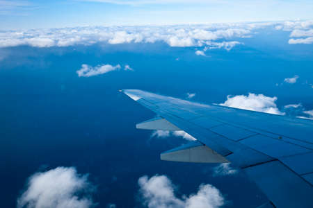 Wings and sea of clouds