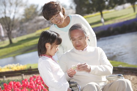 Senior men who get the gift to grandsonの写真素材