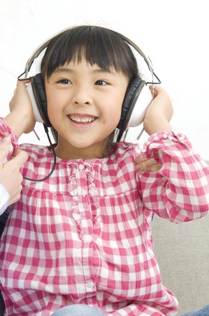 Girl to the headphoneの写真素材