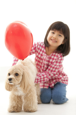 Heart of balloons and Marupu and girlsの写真素材