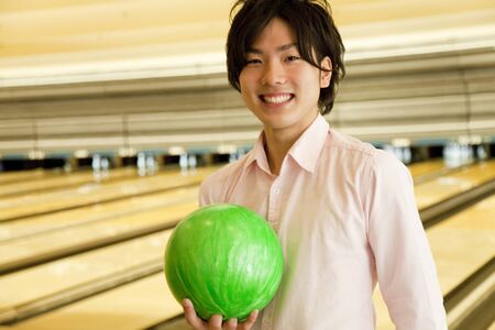 Men with a bowling ballの写真素材