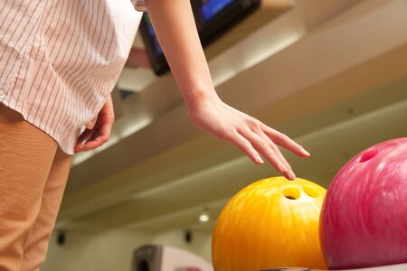 Hand of women who try to have a bowling ballの写真素材