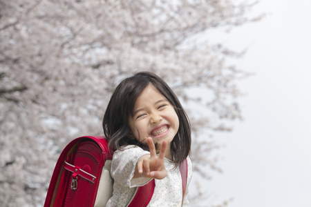 Girl to the peace signの写真素材