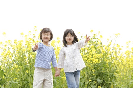 Children to piece hand in handの写真素材