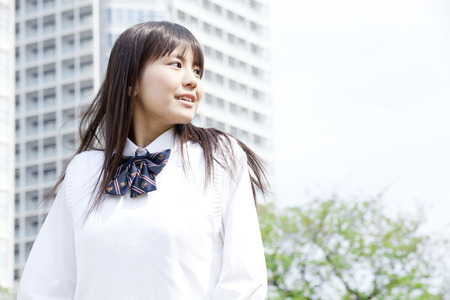 high school girls that turned around smilingの写真素材