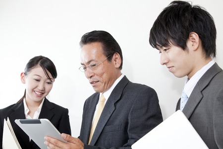 Businessman with a Tablet PCの写真素材