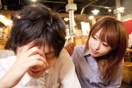 woman to comfort the men fallの写真素材