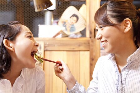 Women who get to eat the cuisineの写真素材