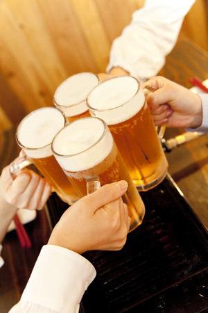 Hand of woman to toast in the women's meetingの写真素材