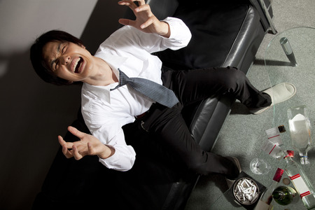 Businessman to seek the heavensの写真素材