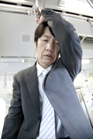 Businessman to droop with a strapの写真素材