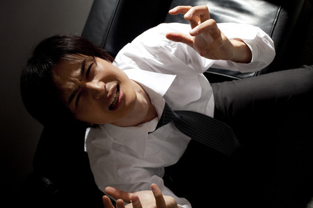 Businessman to seek the heavensの写真素材