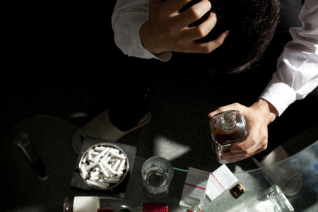 Businessman to droop with a whiskey