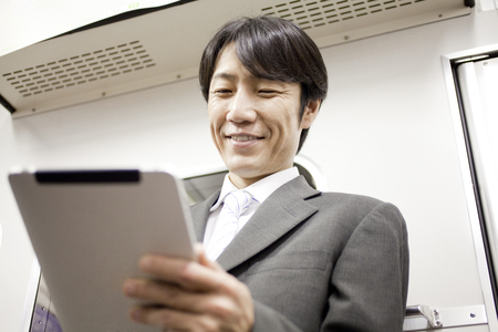 Businessmen working with Tablet PCの写真素材