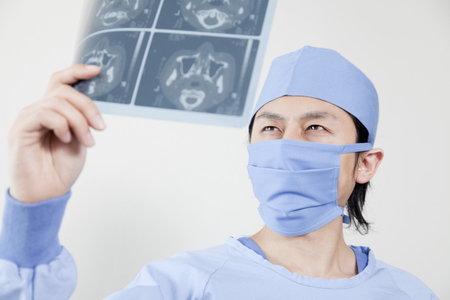 Surgeon to see the X-rayの写真素材
