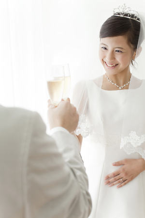 Bride to toast with champagneの写真素材