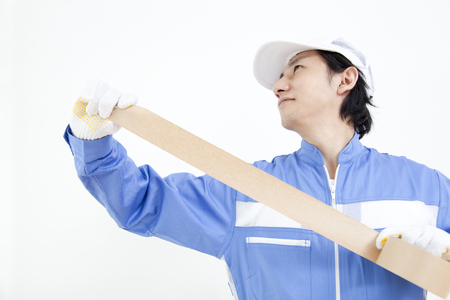 Movers with packing tapeの写真素材
