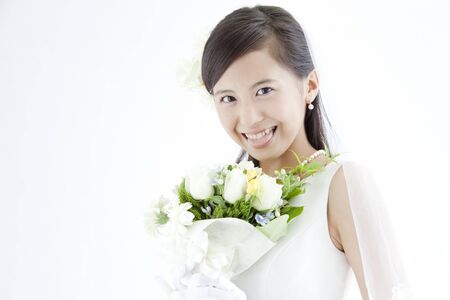 Bride holding bouquetの写真素材