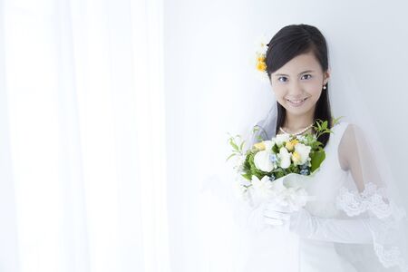 Bride holding bouquetの写真素材