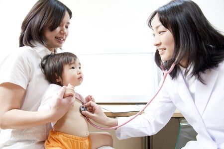 Pediatrician shed stethoscope to childrenの写真素材