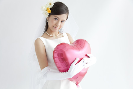 Bride holding balloonsの写真素材