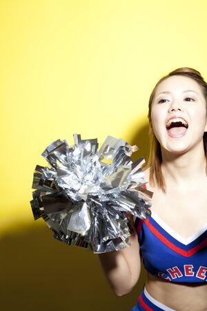 Cheerleader cheer with a smile