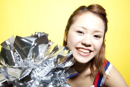 Cheerleader cheer with a smileの写真素材