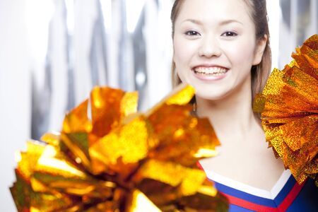 Cheerleader cheer with a smileの写真素材