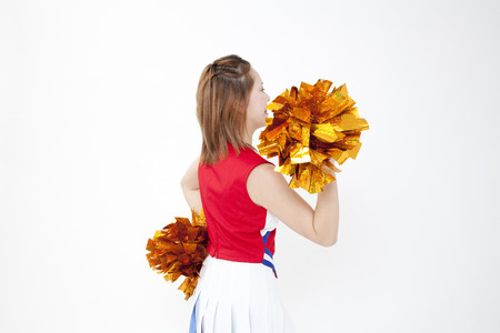 Back shot of cheer to Cheerleaderの写真素材