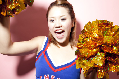 Cheerleader cheer with a smileの写真素材