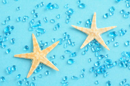 Blue stone and starfish that the image of the seaの写真素材
