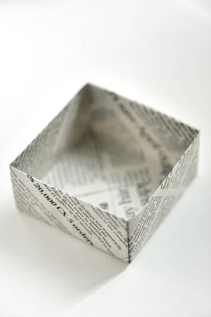 Box made of newspaperの写真素材