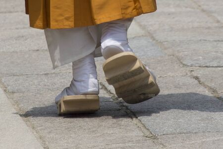 Clogs and white socksの写真素材