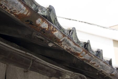 The corroded rain guttersの写真素材