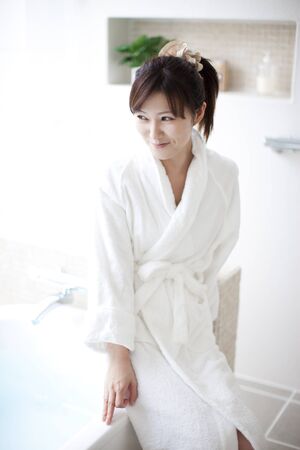 Women dressed in bathrobeの写真素材