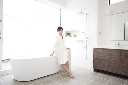 Women dressed in bathrobe