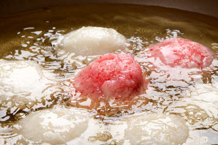 Rice cake frying in oilの写真素材