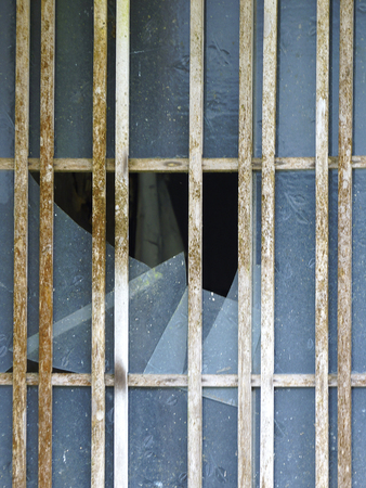 Glass door of the entrance, which was divided in housingの写真素材