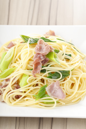Raw ham and Kujo leek pastaの写真素材
