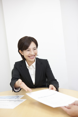 OL presenting the materialの写真素材