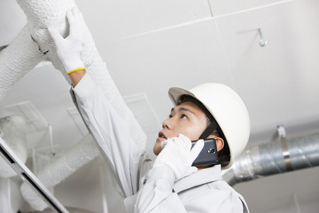 Workers to report the situationの写真素材