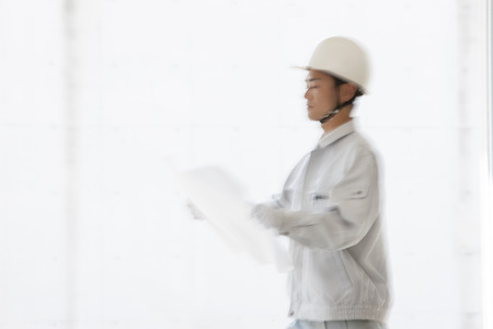 Workers spread the drawingの写真素材