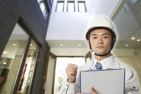 Site supervisor to check inside the Houseの写真素材