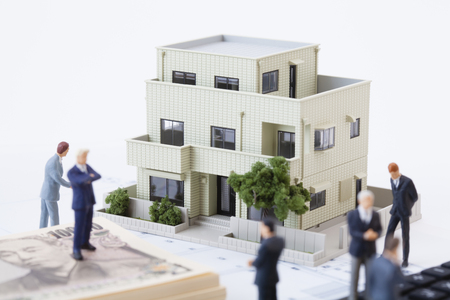 Think about the real estate business figuresの写真素材