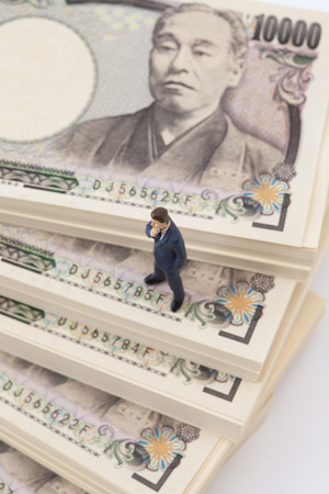 Businessmen see the WAD figuresの写真素材